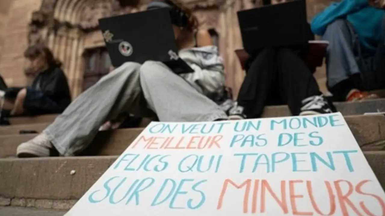 France student protests: Up to 500 schools likely to be partially or fully shut A placard reads, "We want a better world, not cops beating up minors," as students protest outside the closed Fustel de Coulanges secondary school in Strasbourg, eastern France, on Monday. PIC/AFP