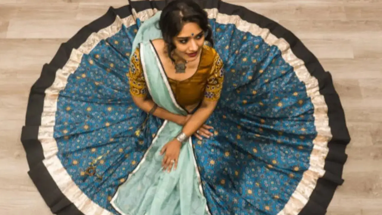 Experiment with interesting cuts, colours and accessories to create a Garba look that reflects your personal style. File pic