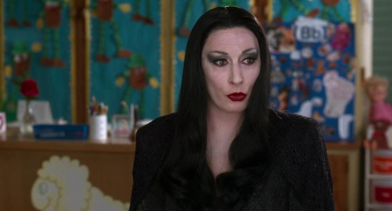 If you're looking for something effortlessly elegant, and glamourous, dress as Morticia Addams in a floor-sweeping, form-fitting black gown with dramatic bell or batwing sleeves. Pair it with bone-white skin, a stark center-parted long black wig, and a crimson lip. If you're looking for something effortlessly elegant, and glamourous, dress as Morticia Addams in a floor-sweeping, form-fitting black gown with dramatic bell or batwing sleeves. Pair it with bone-white skin, a stark center-parted long black wig, and a crimson lip.