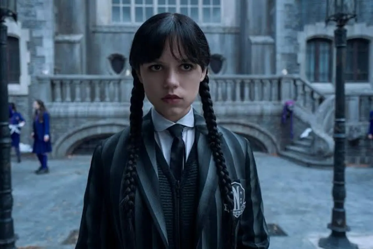 Turn into Wednesday Addams in a dark black dress with a crisp white pointy collar, braided pigtails, and deadpan-ready dark lipstick. Turn into Wednesday Addams in a dark black dress with a crisp white pointy collar, braided pigtails, and deadpan-ready dark lipstick.