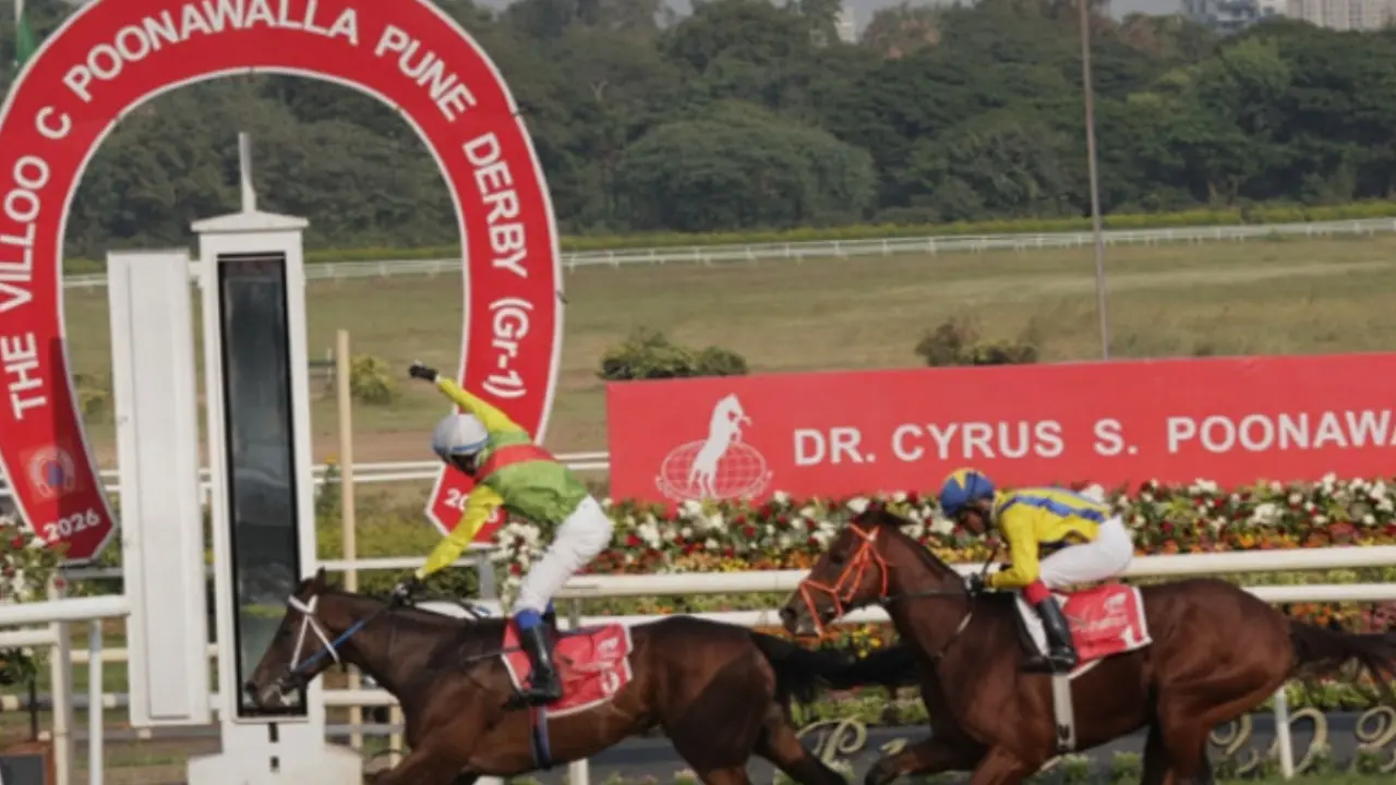 Jaandaar wins Villoo C Poonawalla Pune Derby (Gr 1) Vivek G astride Jaandaar raises his hand in triumph at the finish of the Villoo C Poonawalla Pune Derby (Gr 1) at the Pune racetrack on Sunday. pic/RWITC