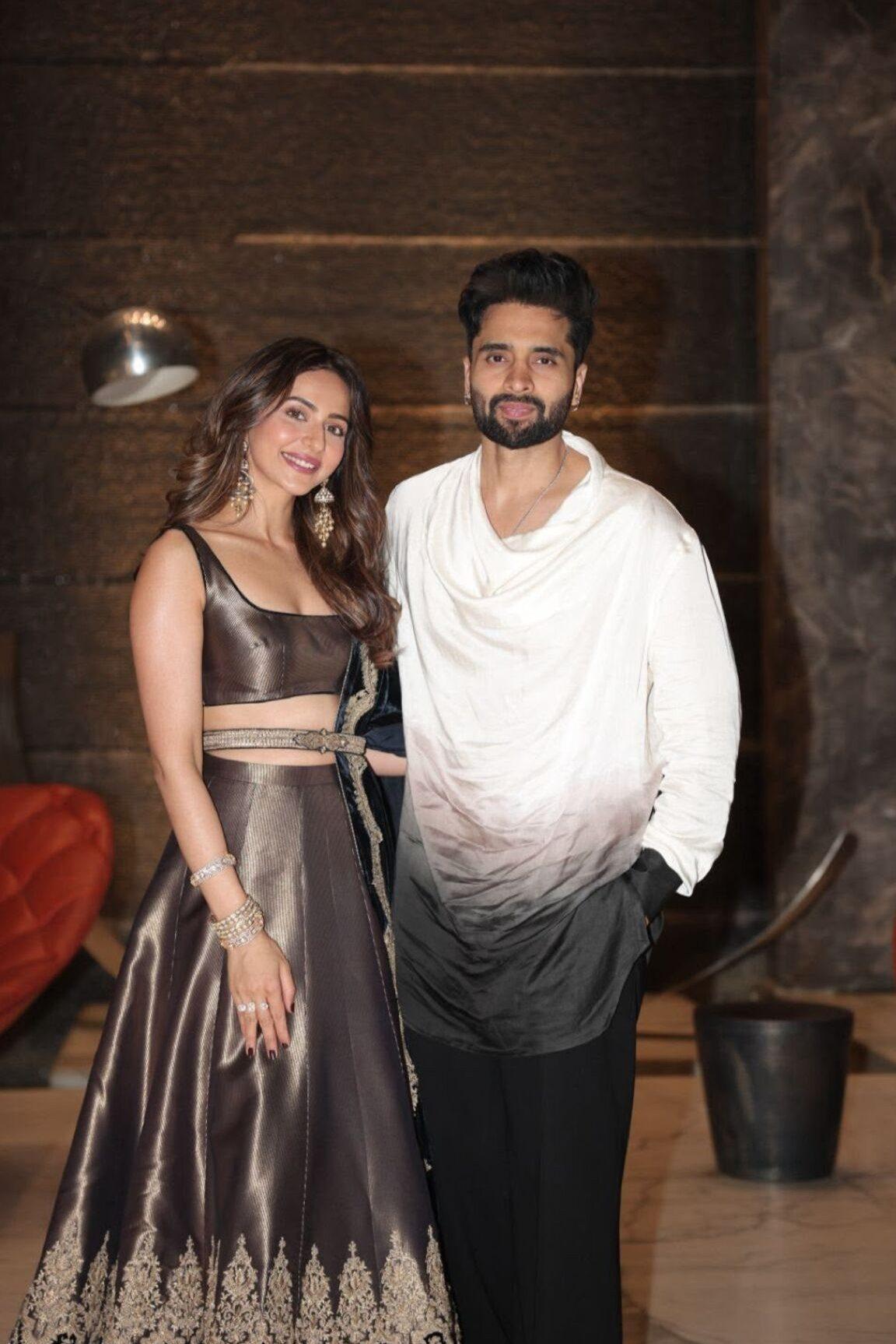 Rakul Preet Singh and Jackky Bhagnani made a stylish appearance at Ayushmann Khurrana's Diwali bash. Rakul stunned in a metallic lehenga set paired with traditional jewelry. Rakul Preet Singh and Jackky Bhagnani made a stylish appearance at Ayushmann Khurrana's Diwali bash. Rakul stunned in a metallic lehenga set paired with traditional jewelry.