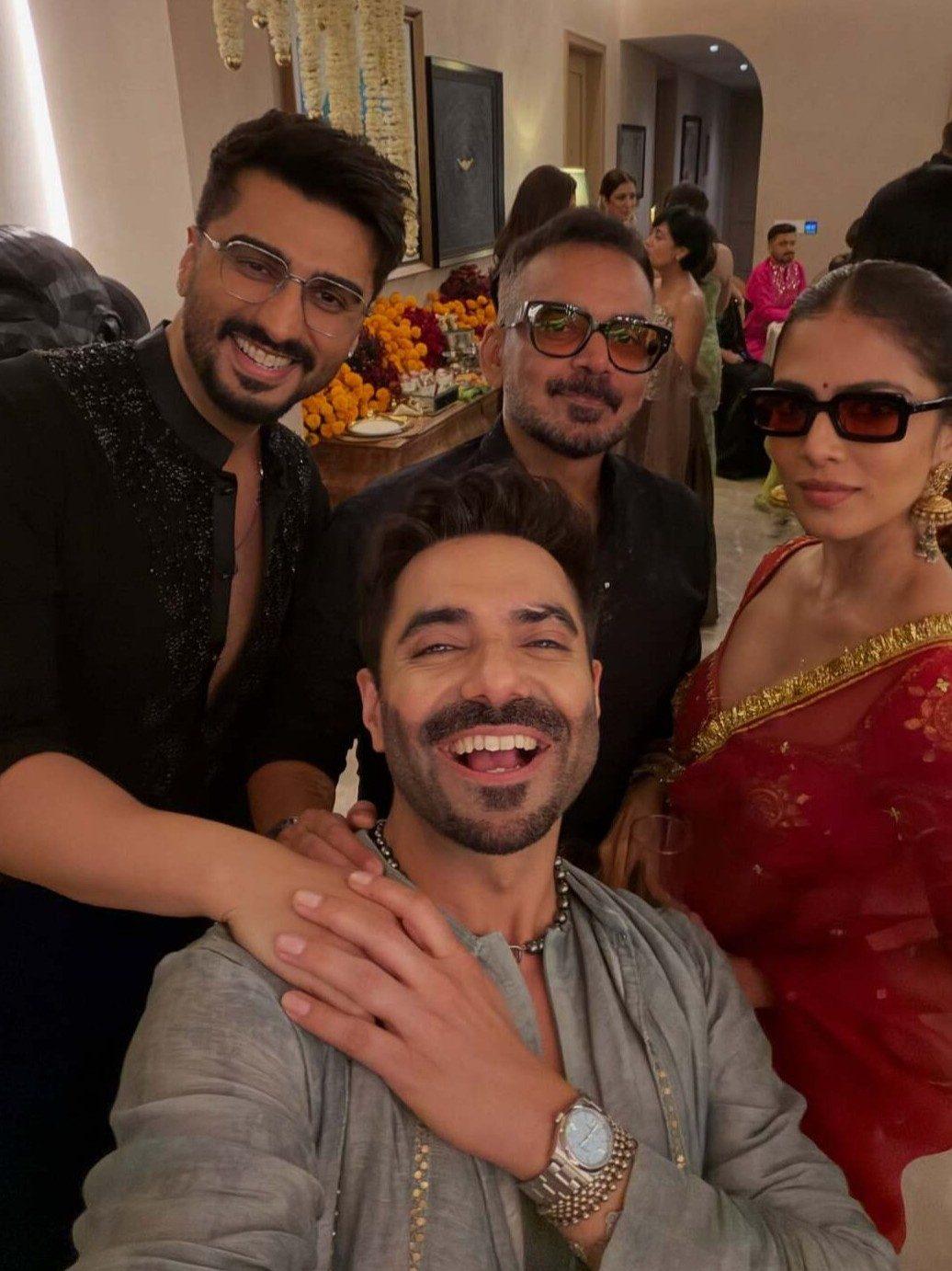 Apar shakti is seen flashing his bright smile as he posed with Arjun Kapoor, who looked dapper in black. Apar shakti is seen flashing his bright smile as he posed with Arjun Kapoor, who looked dapper in black.