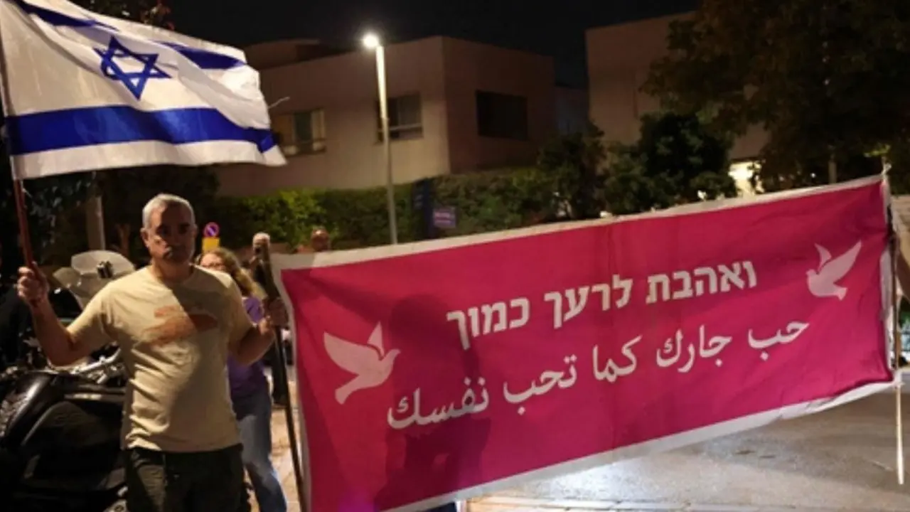 Israel election: Netanyahu faces political challenge as Arab-led parties win record seats in Knesset Israeli left-wing activists hold placards during a demonstration in Herzliya on Thursday, calling for the formation of a government that includes Arab parties. PIC/AFP