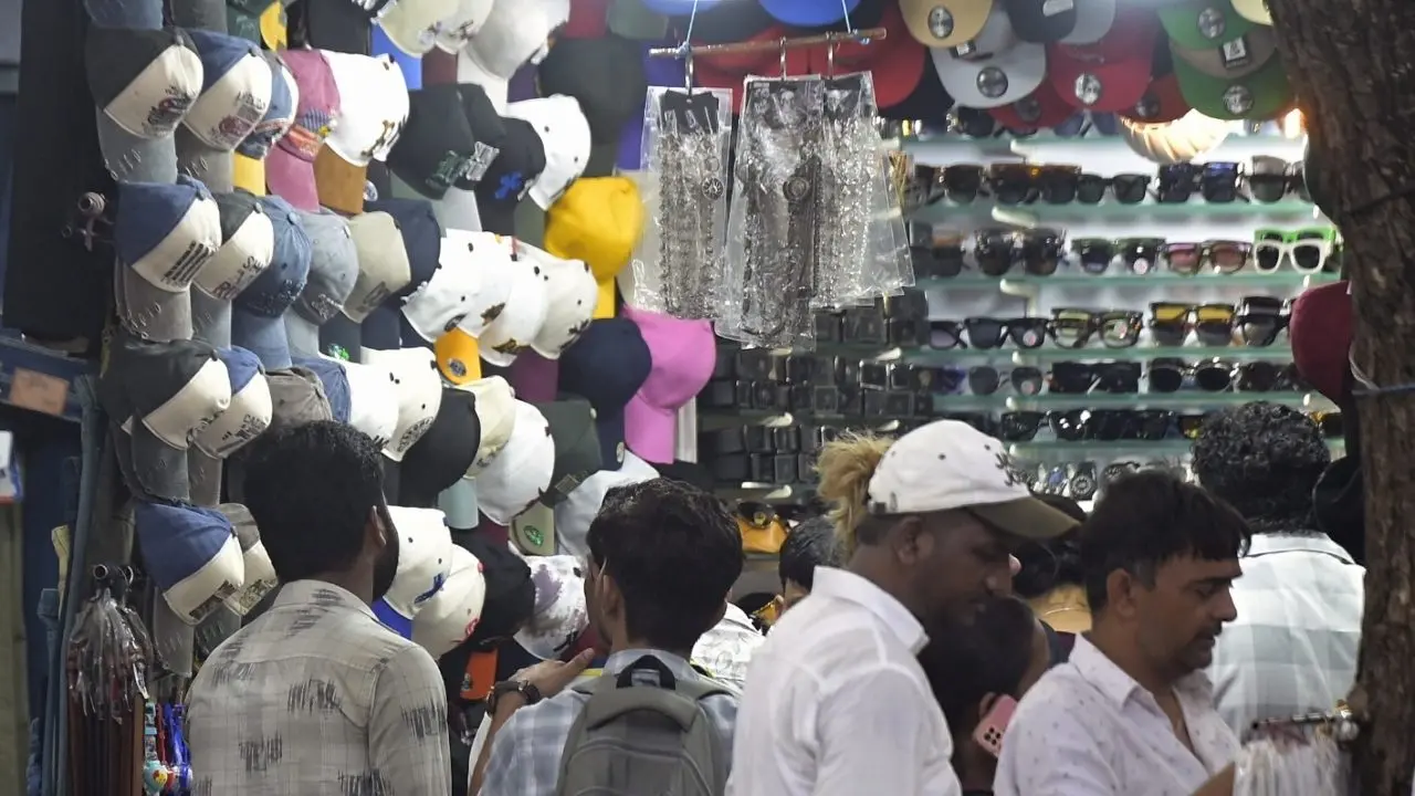 A vendor selling caps and goggles at Fashion Street in Mumbai on Saturday, October 24, 2026, as people take precautions against the afternoon sun. A vendor selling caps and goggles at Fashion Street in Mumbai on Saturday, October 24, 2026, as people take precautions against the afternoon sun.