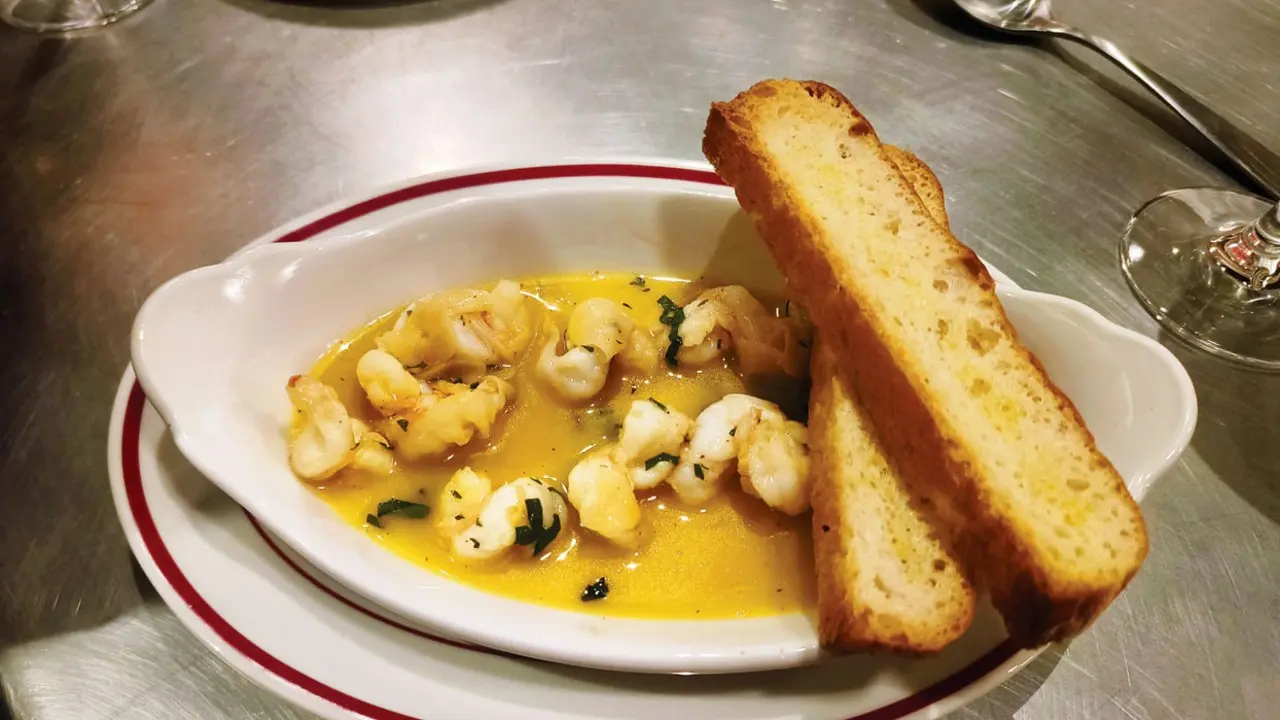 ‘I love that pizza is totally democratic’ Shrimp Scampi (R750) comes as a sharing plate offering scampi in a pool of lemon butter sauce cooked in white wine. Slivers of garlic and shred of basil and parsley add freshness to the bite