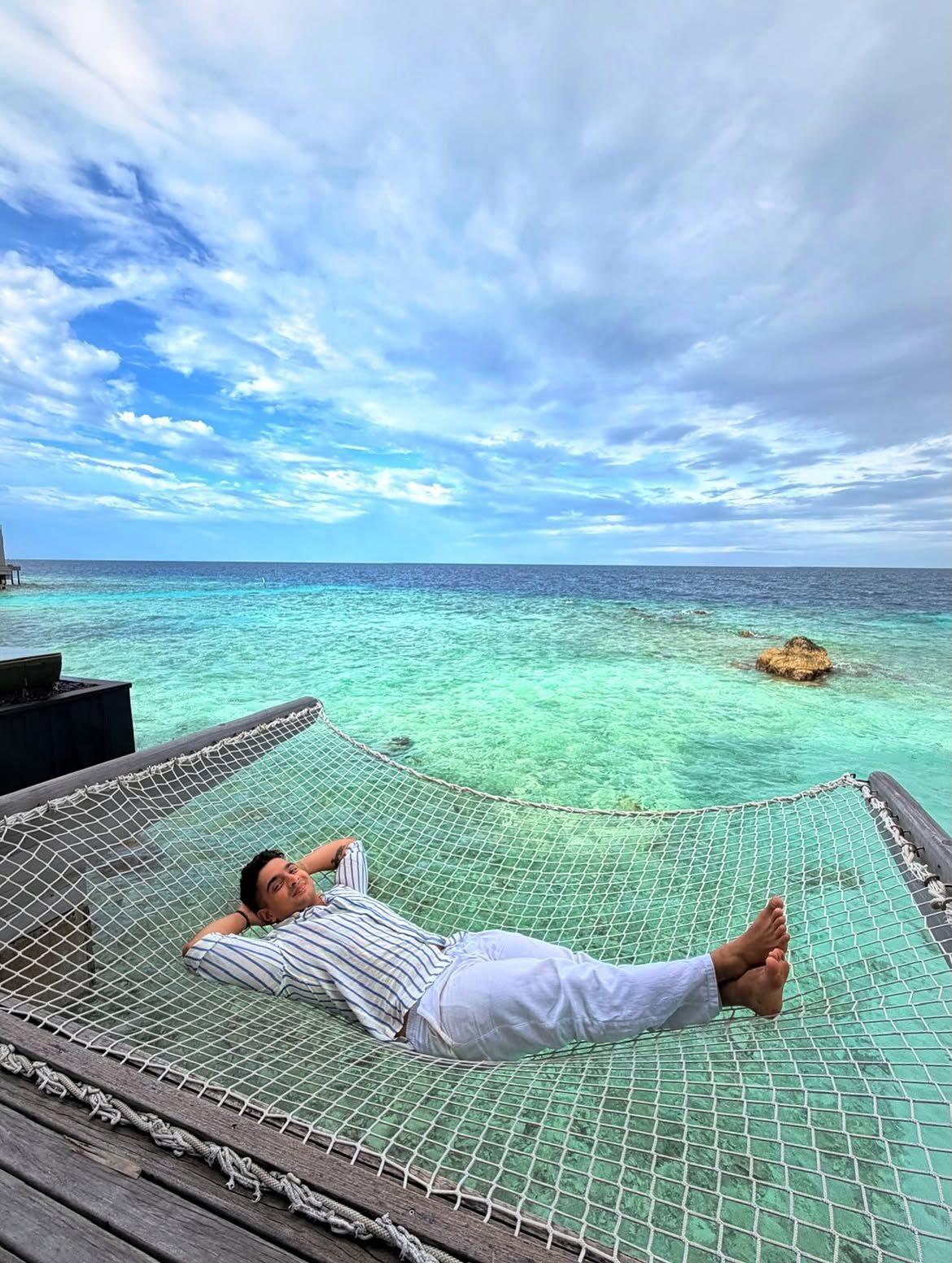 Ranveer enjoyed some downtime on a tropical swing net, surrounded by the beautiful beach waters. Ranveer enjoyed some downtime on a tropical swing net, surrounded by the beautiful beach waters.