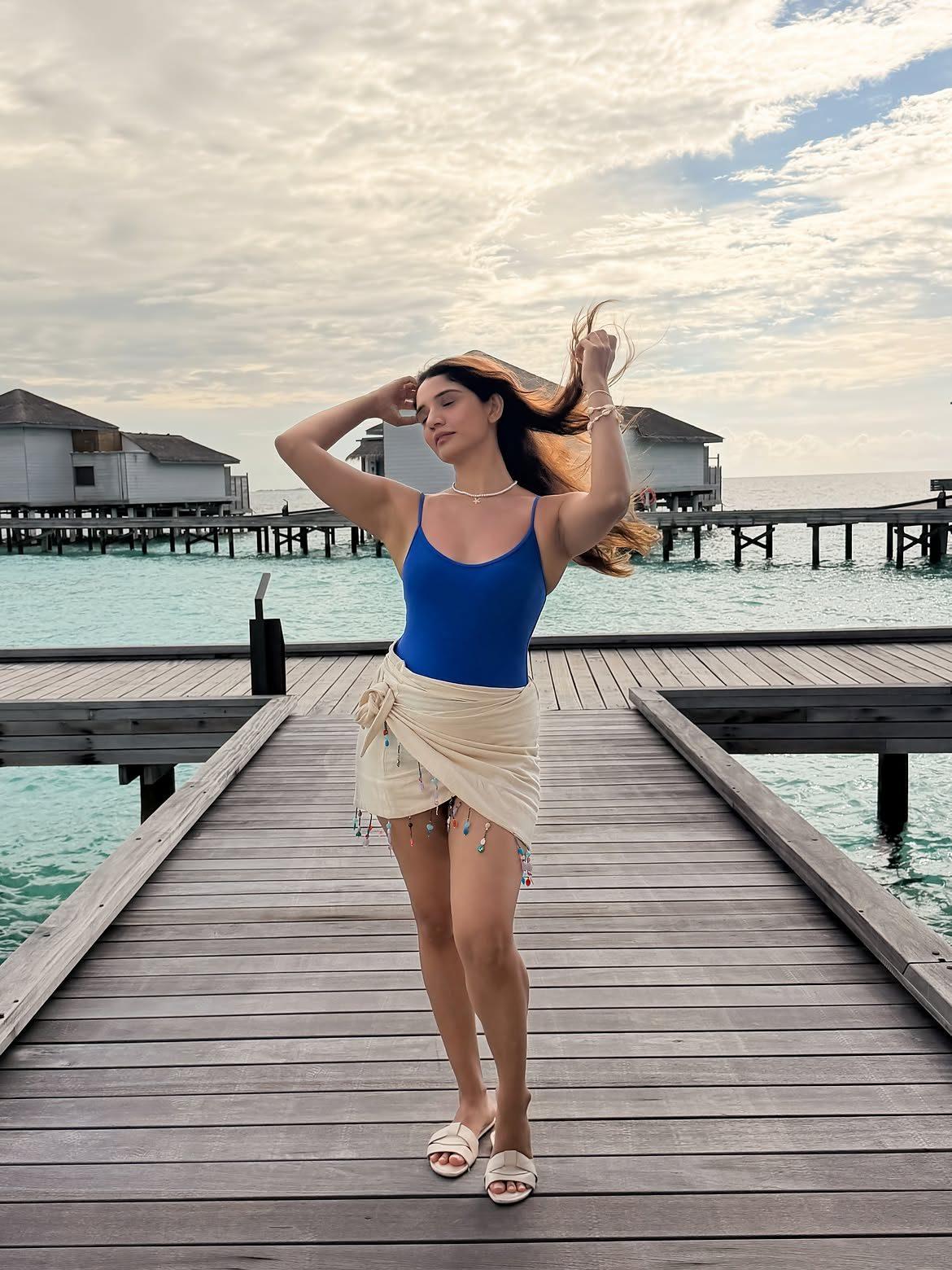 Juhi looked gorgeous in a chic blue top paired with a skirt, serving yet another fashionable vacation look. Juhi looked gorgeous in a chic blue top paired with a skirt, serving yet another fashionable vacation look.