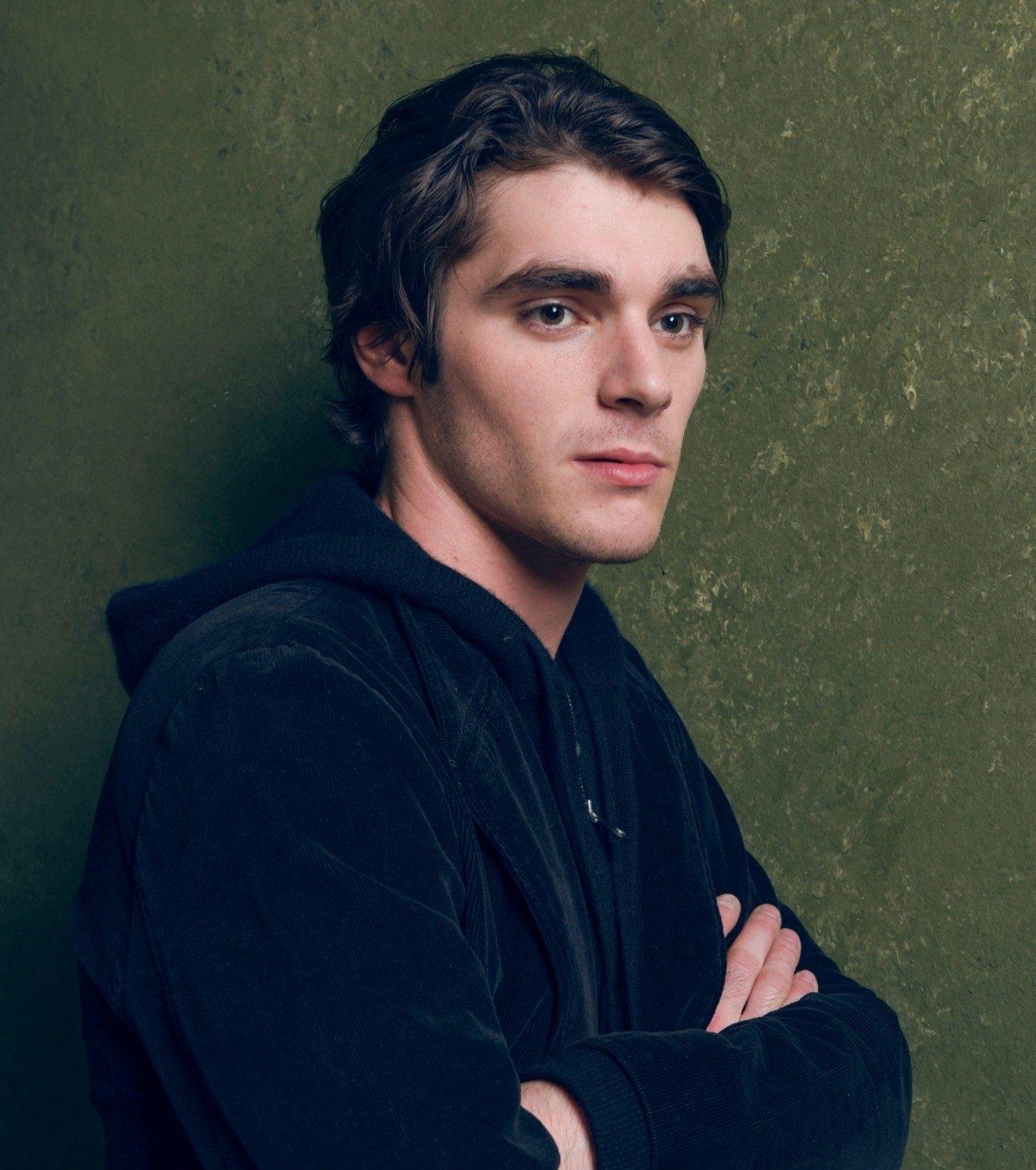After receiving roles as an extra, including in the Disney teen sitcom Hannah Montana, he decided to take acting lessons. Shortly after, he was offered the role of Walter White Jr., a character who also has cerebral palsy, in Breaking Bad.