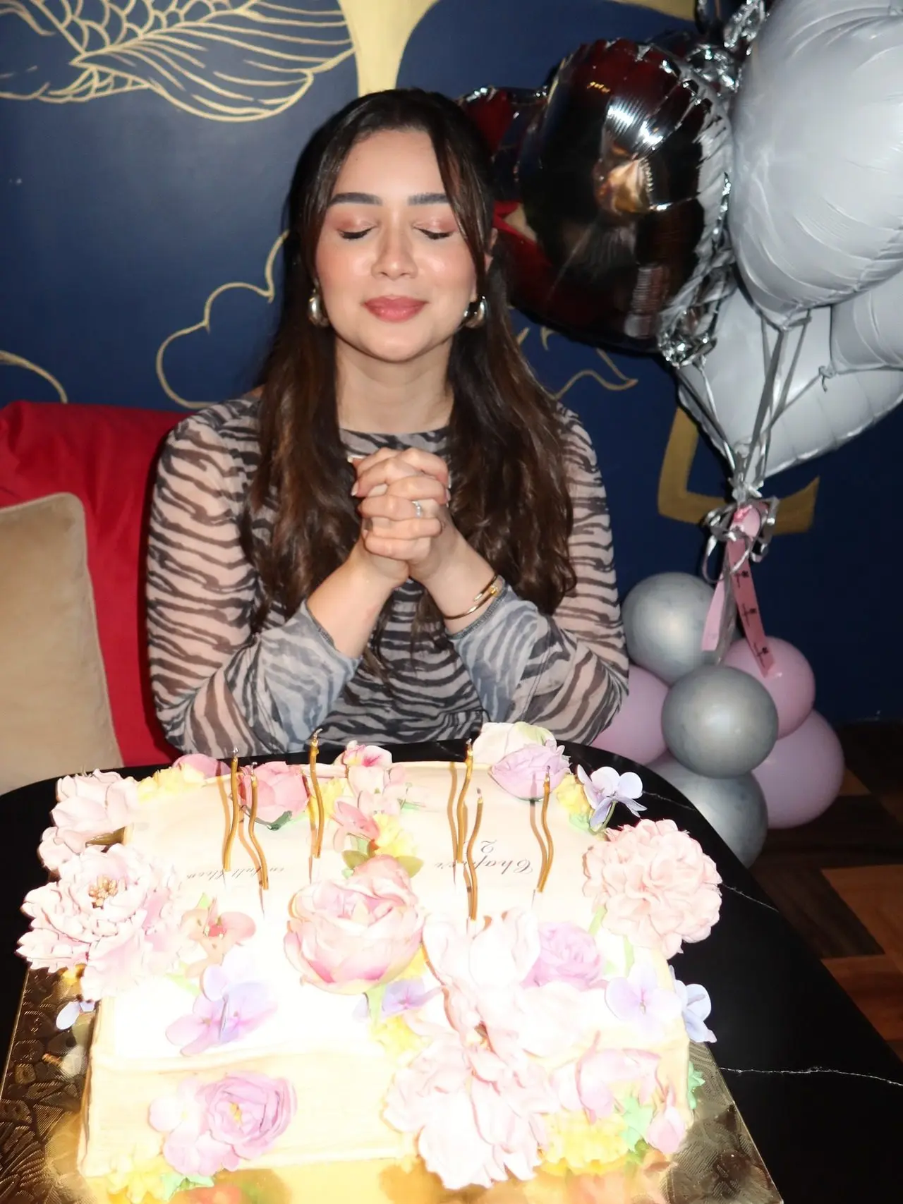 Sara was seen making a wish before slicing her birthday cake in one of the pictures.