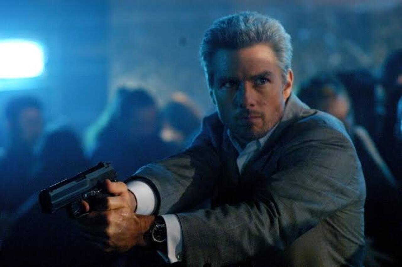 Cruise traded his youthful heartthrob image to play a cold, ruthless hitman Vincent in Collateral (2004). He sported a sharp, salt-and-pepper gray look with a wig, matching gray facial scruff, a sleek grey suit, and deadened eyes. Cruise traded his youthful heartthrob image to play a cold, ruthless hitman Vincent in Collateral (2004). He sported a sharp, salt-and-pepper gray look with a wig, matching gray facial scruff, a sleek grey suit, and deadened eyes.