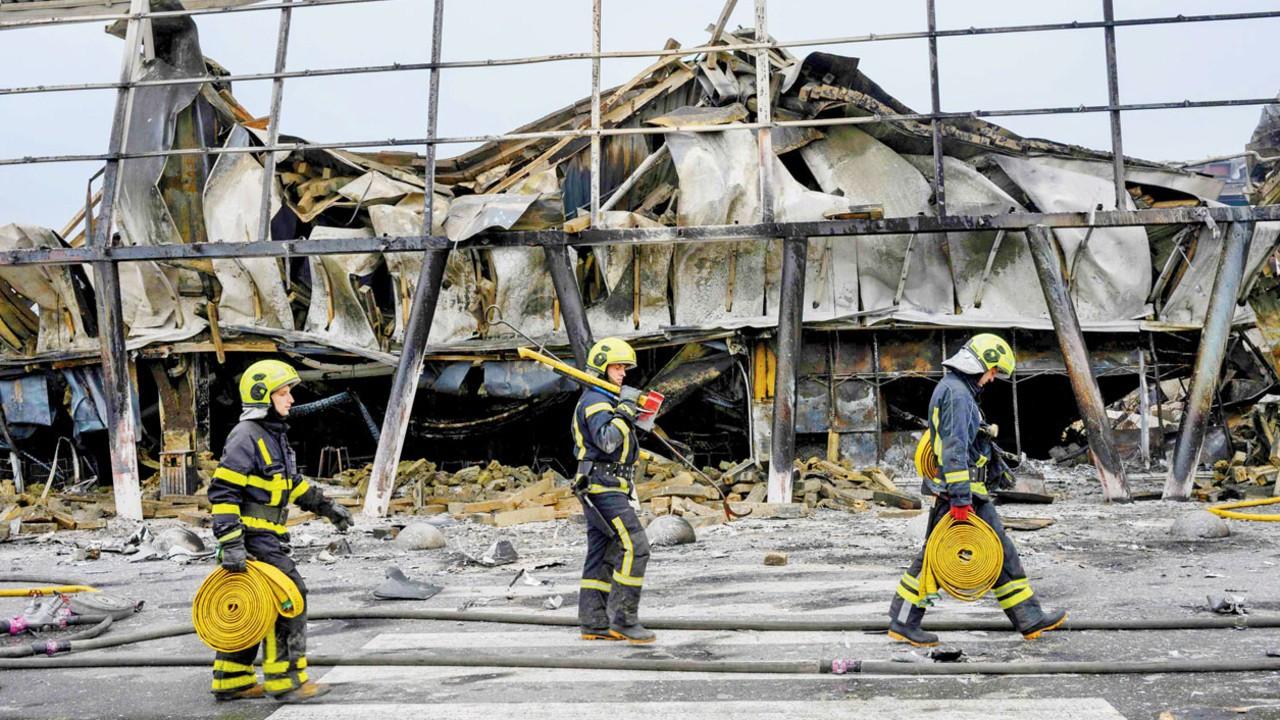 Ukraine and Russia signal willingness to resume US-brokered peace talks Ukrainian rescuers walk at by a shopping centre damaged following a missile strike in Kyiv on Thursday. Pics/PTI