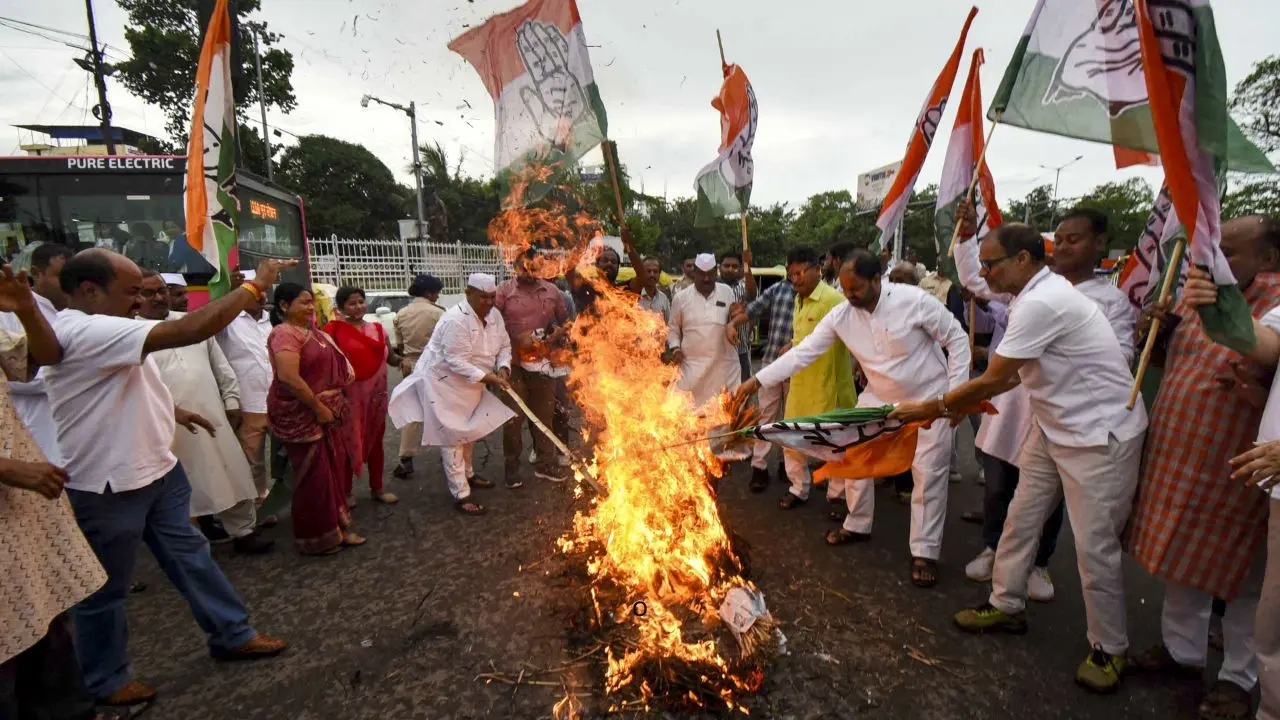 IN PHOTOS | SIR row: Congress protests against CEC Gyanesh Kumar Congress party workers burn an effigy of Chief Election Commissioner Gyanesh Kumar during a protest, in Patna, Bihar, on Wednesday. PIC/PTI