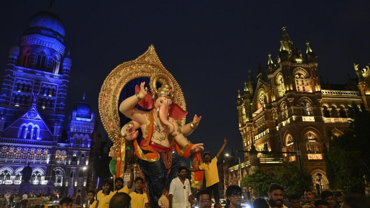 IN PHOTOS | Ganesh Chaturthi 2026: Iconic idols roll through streets The Ganesh idol of Fort Cha Raja Ganesh Utsav Mandal being taken in procession past BMC headquarters and Chhatrapati Shivaji Maharaj Terminus on Saturday. PIC/ASHISH RAJE