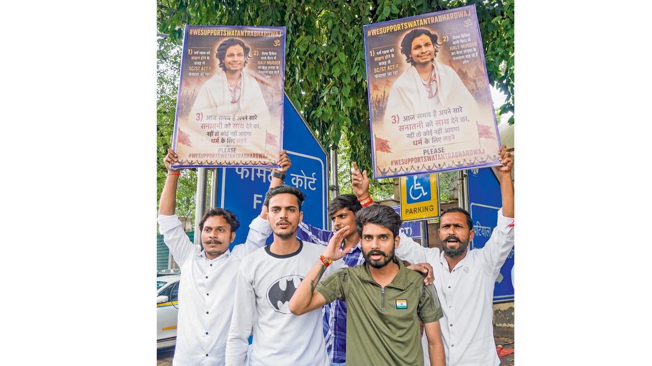 Delhi court sends Swatantra Bhardwaj to custody in alleged assault case Supporters Swatantra Bhardwaj gather outside court. PIC/PTI