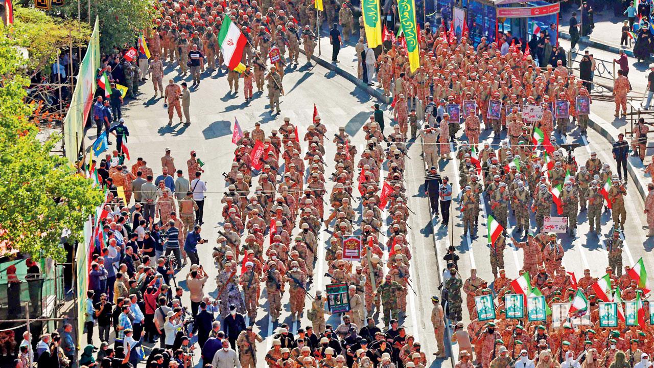 Thousands rally across Iran pledge readiness to fight after months of war Members of Iran’s Basij paramilitary force take part in a military rally. Pics/AFP