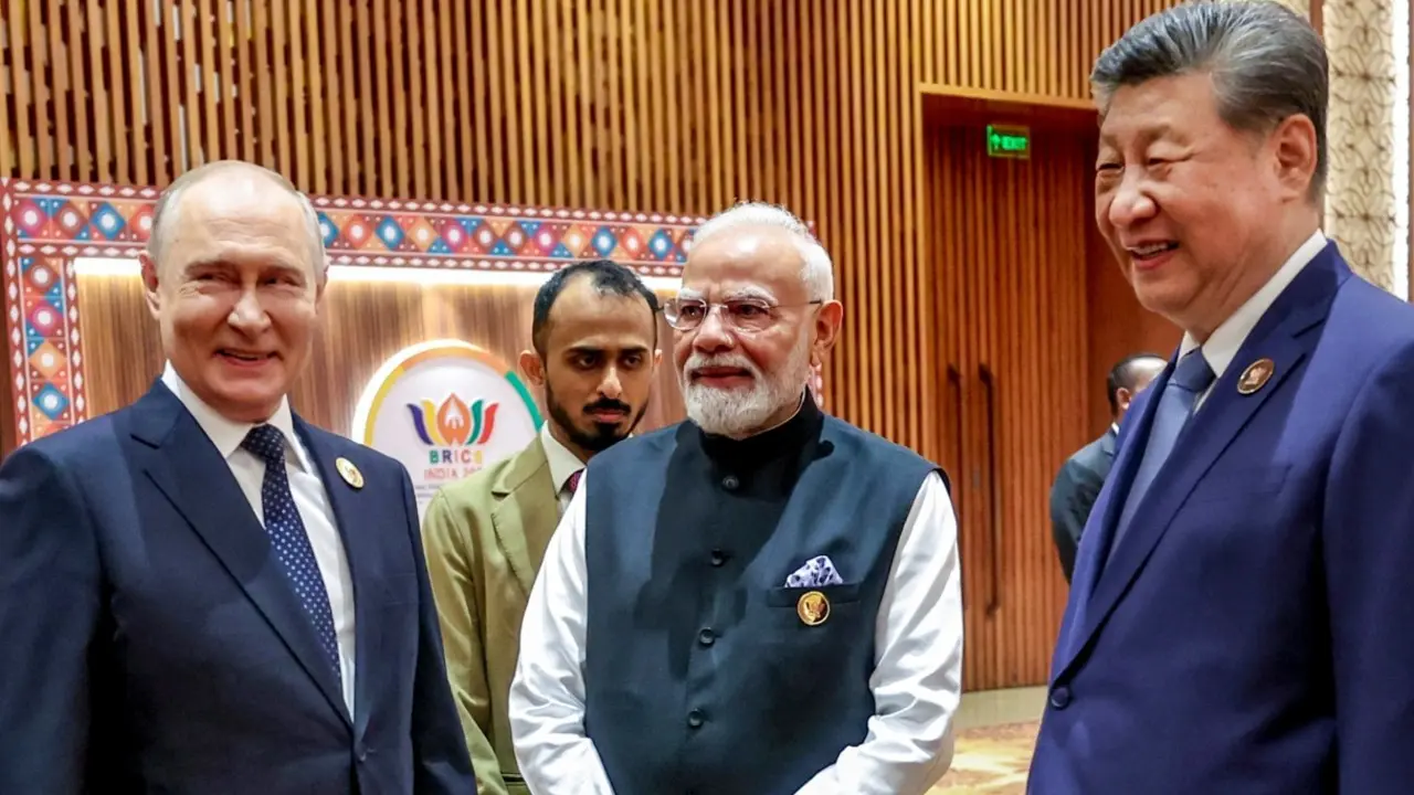 In Photos: BRICS Summit begins as PM Modi welcomes Putin, Xi Jinping and leaders Prime Minister Narendra Modi with Chinese President Xi Jinping, Russian President Vladimir Putin. Pic/PTI