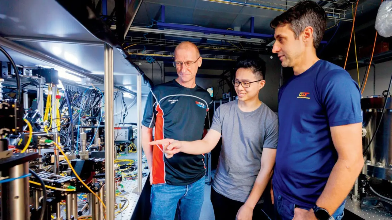 Singapore researchers develop world’s most precise optical atomic clock (From left) Prof Murray Barrett, PhD student Michael Lee, scientist Kyle Arnold with the clock. Pic Courtesy/Centre for Quantum Technologies