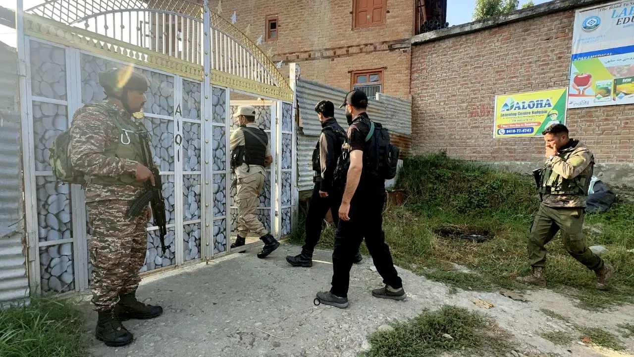 Jammu-Kashmir terror conspiracy: NIA searches 10 locations linked to LeT network Security personnel stand guard as a team of the National Investigation Agency (NIA) conducts a search operation, in Kulgam, Jammu and Kashmir, on Saturday. PIC/PTI