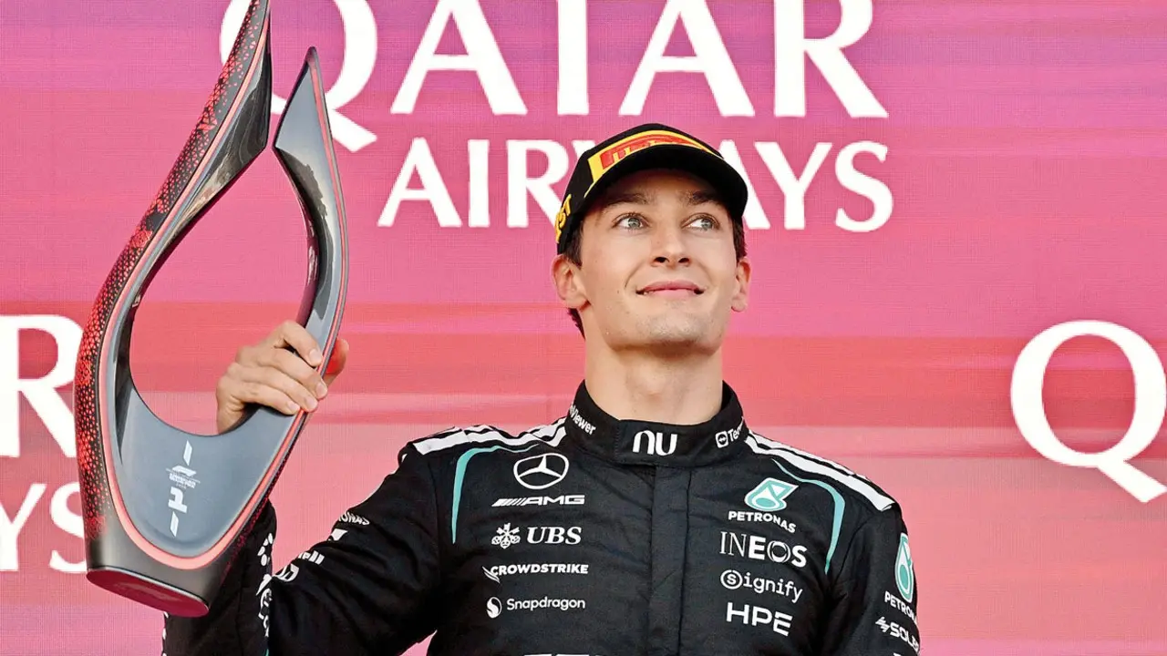 F1: Russell holds off Verstappen to win Azerbaijan Grand Prix George Russell with the winner’s trophy on Saturday. Pic/AFP