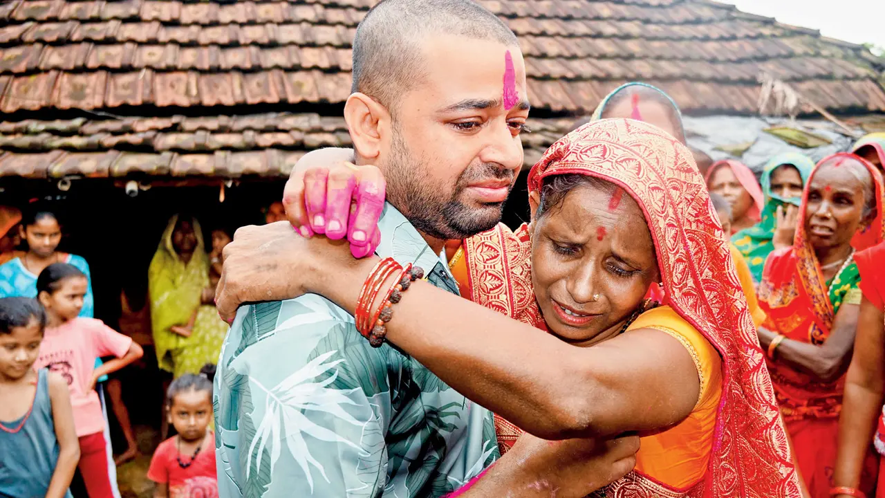 Nepal rescue teams clear tunnel debris to reach six trapped workers Nepali hydropower worker Sanjay Sah breaks down after meeting his mother at his residence in Nepal’s Saptari district on Sunday. PIC/PTI