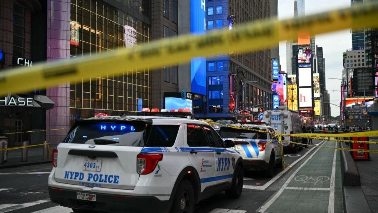 IN PHOTOS | Times Square stabbing: Bank of America executive killed New York City Police vehicles are seen in the area where an officer-involved shooting left one dead near Times Square, in New York, on Wednesday, August 31. PIC/AFP