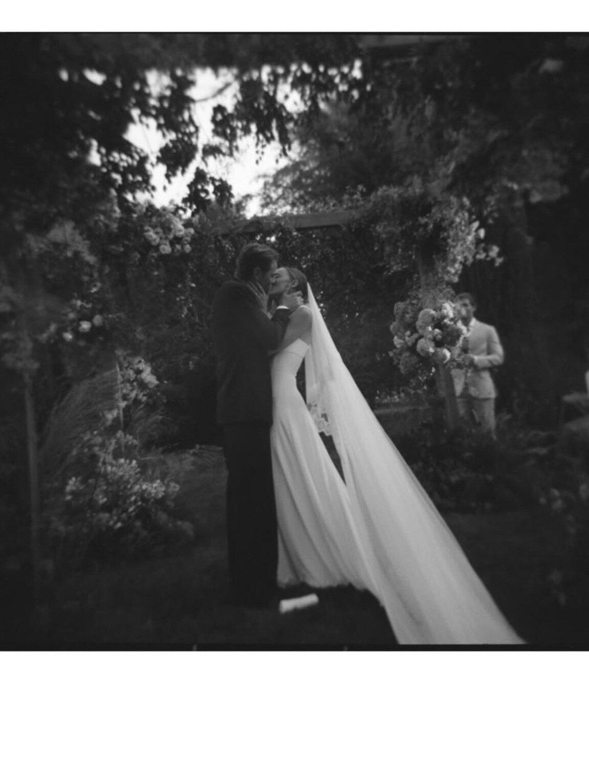 Dynevor shared the news on Instagram, posting photos of the newlyweds sharing a kiss by their ceremony arch and walking together afterward. She captioned the post, "Married my best friend."
