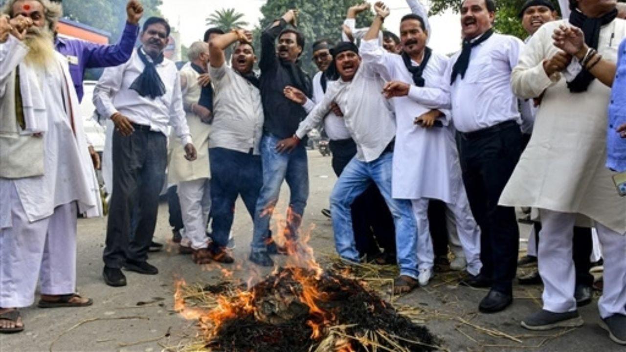 Congress workers burn an effigy during a protest against Kumar in Prayagraj, Uttar Pradesh Congress workers burn an effigy during a protest against Kumar in Prayagraj, Uttar Pradesh