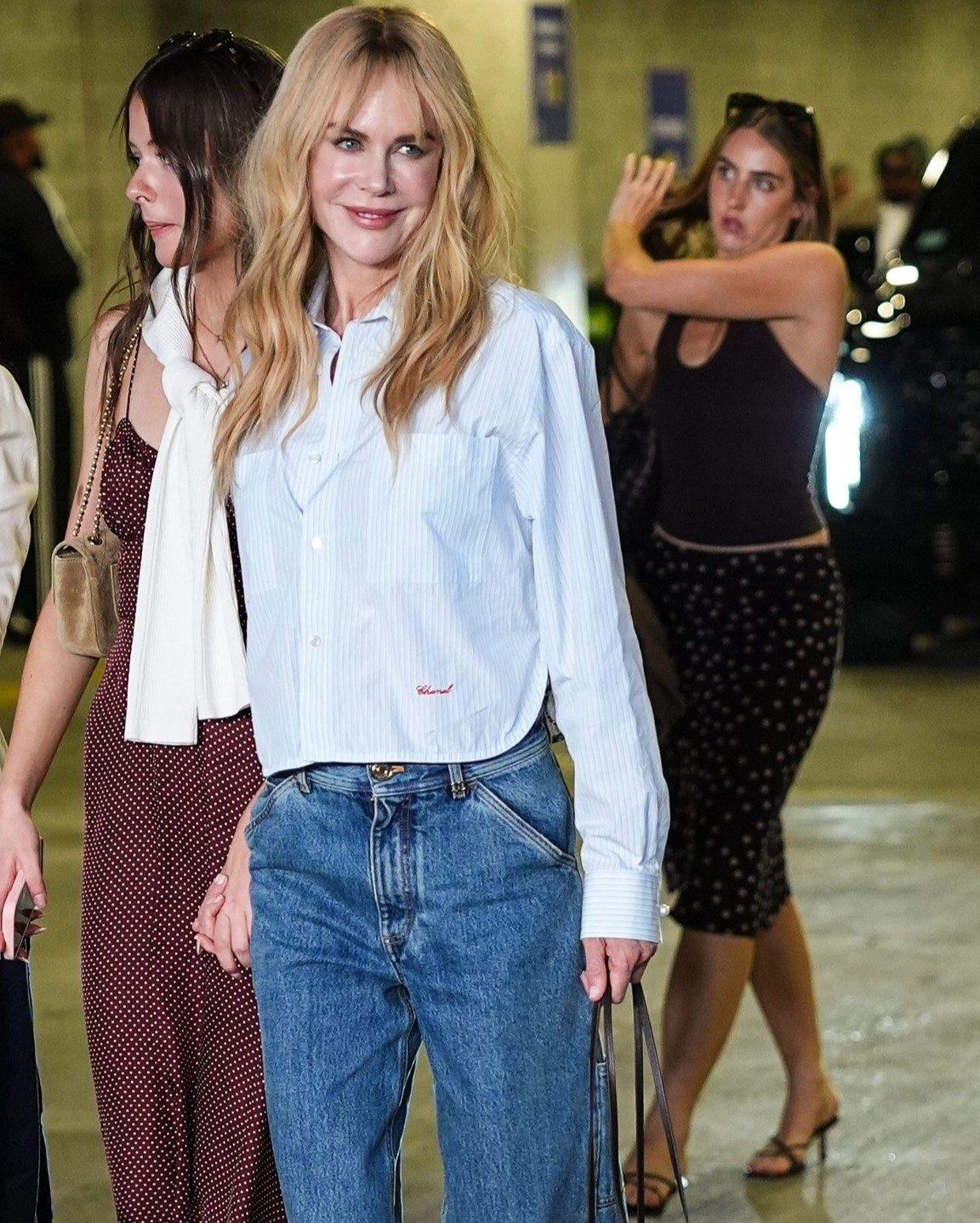 Nicole Kidman kept it simple and stylish in a light blue striped shirt paired with high-waisted, relaxed-fit blue jeans.