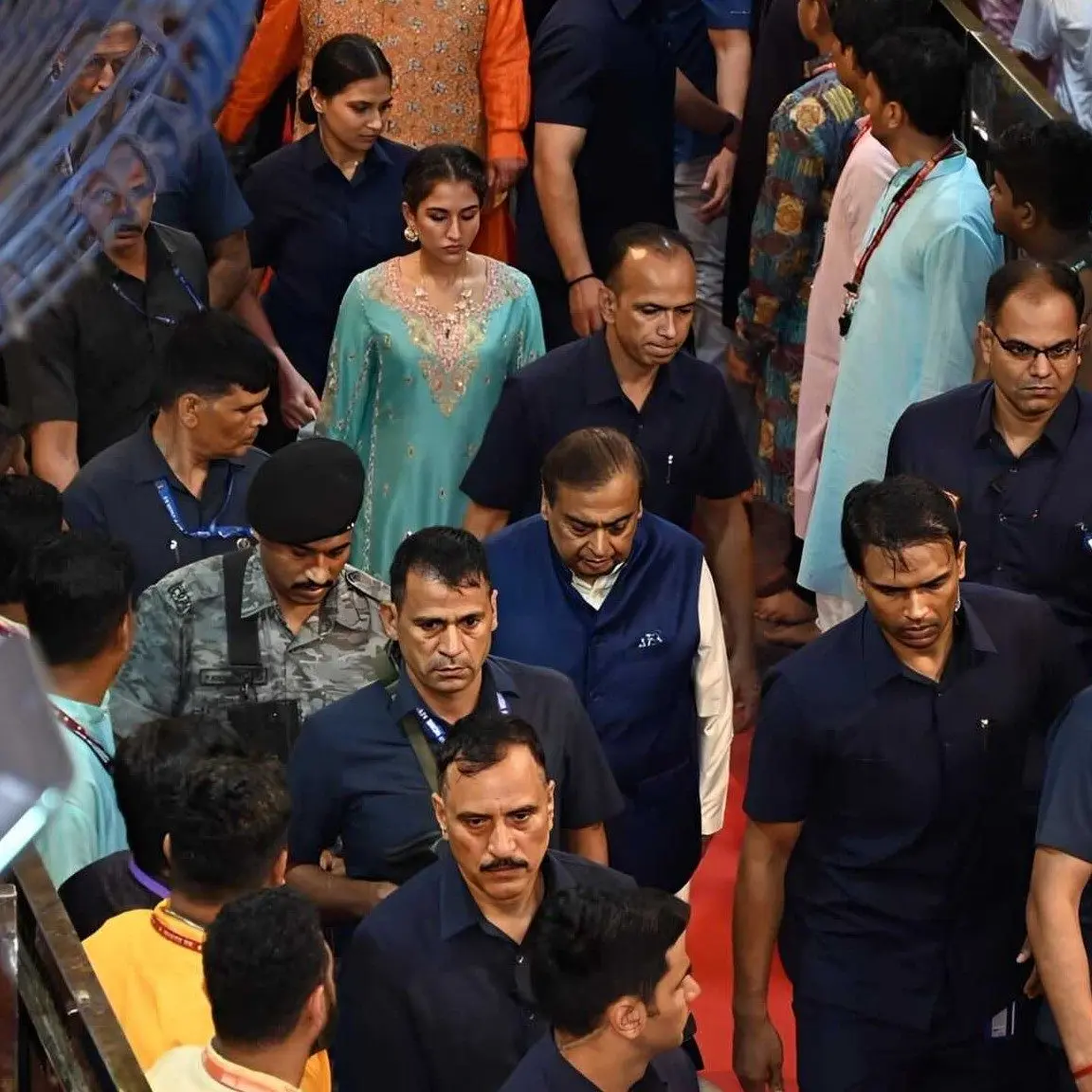 Businessman Mukesh Ambani was spotted with daughter-in-law Radhika Ambani at the divine pandal to seek blessings.