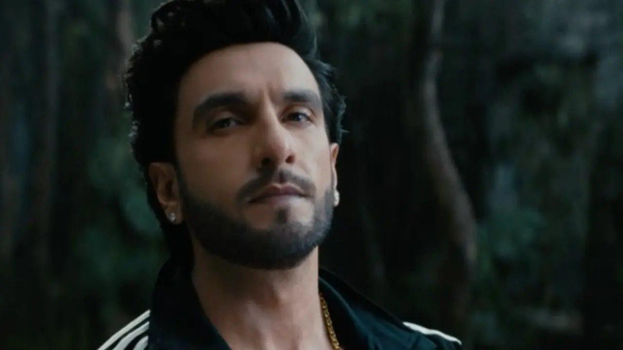 Ranveer Singh’s leaked look from Pralay has created a buzz online. The actor is seen sporting long hair and a rugged avatar while carrying a child. Read more