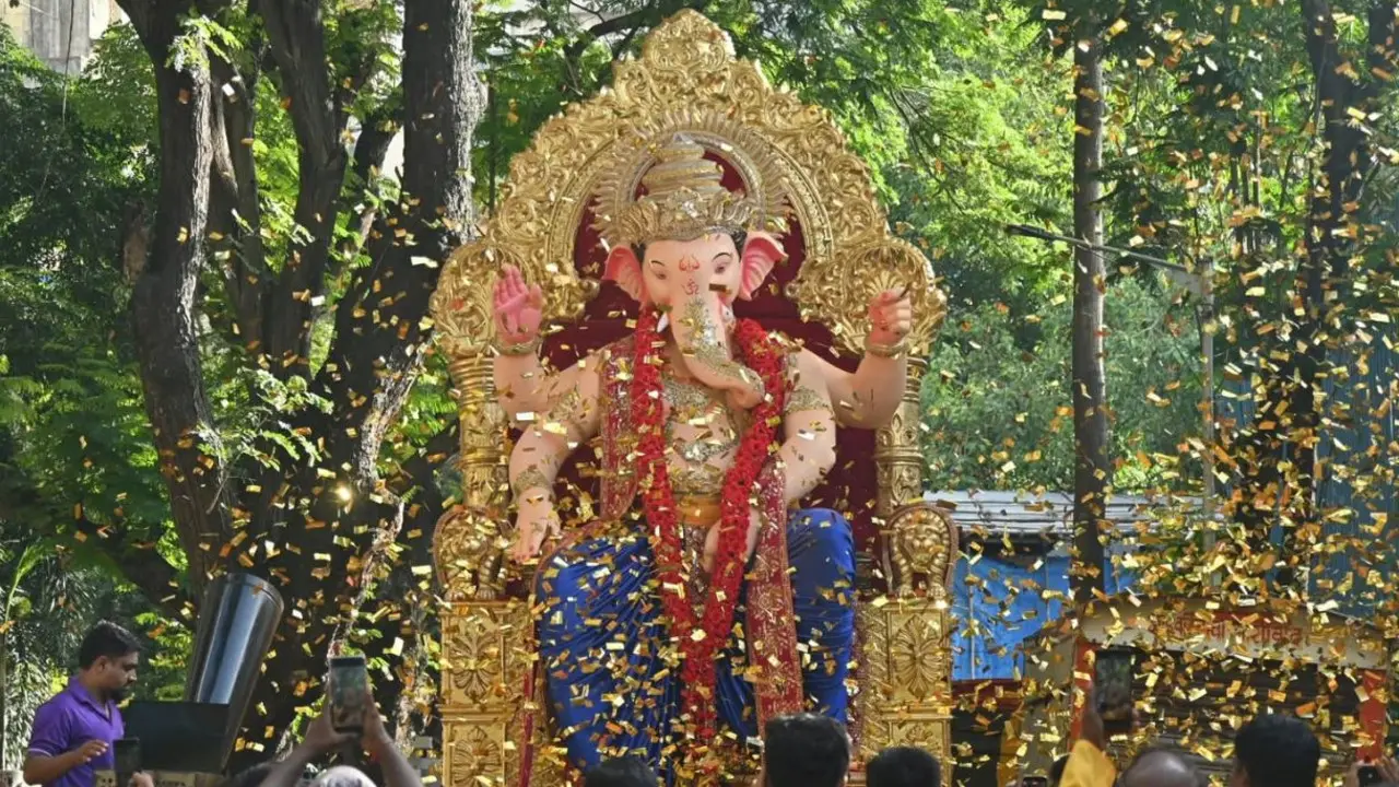 Devotees were seen gathering in parts of the city for colourful processions adding to the festive atmosphere in Mumbai. Pics/Shadab Khan and Atul Kamble Devotees were seen gathering in parts of the city for colourful processions adding to the festive atmosphere in Mumbai. Pics/Shadab Khan and Atul Kamble