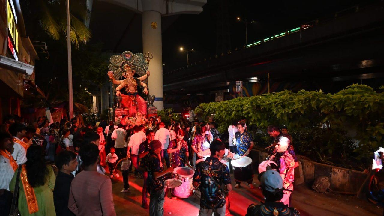Members of the Ganganagar Sarvajanik Ganeshotsav Mandal also carried their Ganesh idol during the seventh-day immersion procession near Thakur Complex Signal in Kandivali East Members of the Ganganagar Sarvajanik Ganeshotsav Mandal also carried their Ganesh idol during the seventh-day immersion procession near Thakur Complex Signal in Kandivali East