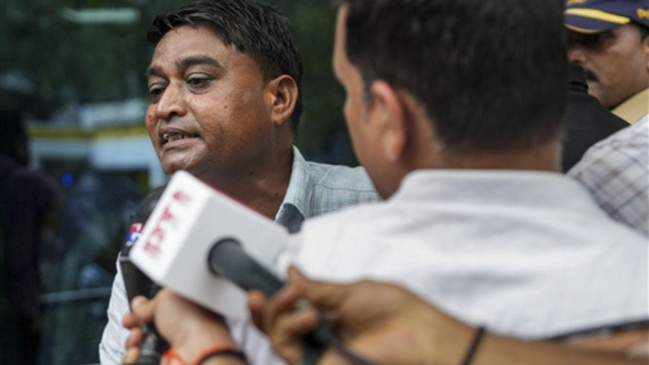 Ravindra Wakode, father of IIT-B student Sahil Wakode, speaks to the media at the Crime Branch office in Bandra West, Mumbai, while seeking an investigation into his son’s death