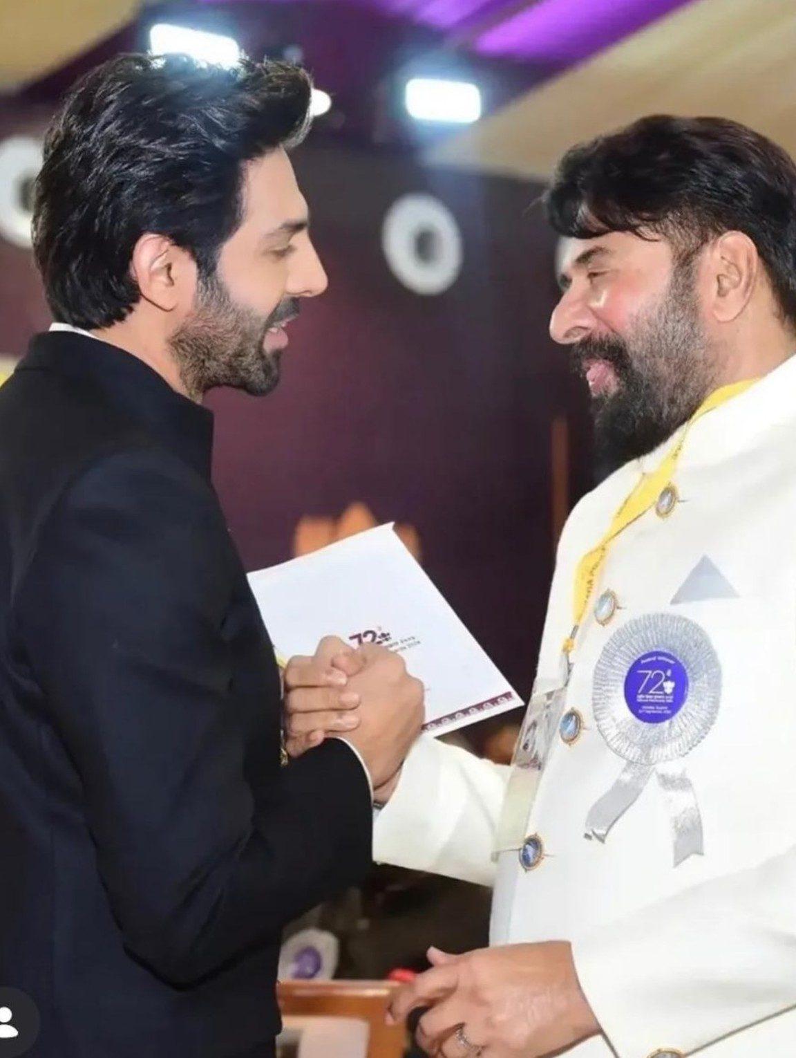 Kartik Aaryan shared a warm moment with veteran actor Mammootty. The two exchanged greetings and smiles as they met at the event. Kartik Aaryan shared a warm moment with veteran actor Mammootty. The two exchanged greetings and smiles as they met at the event.