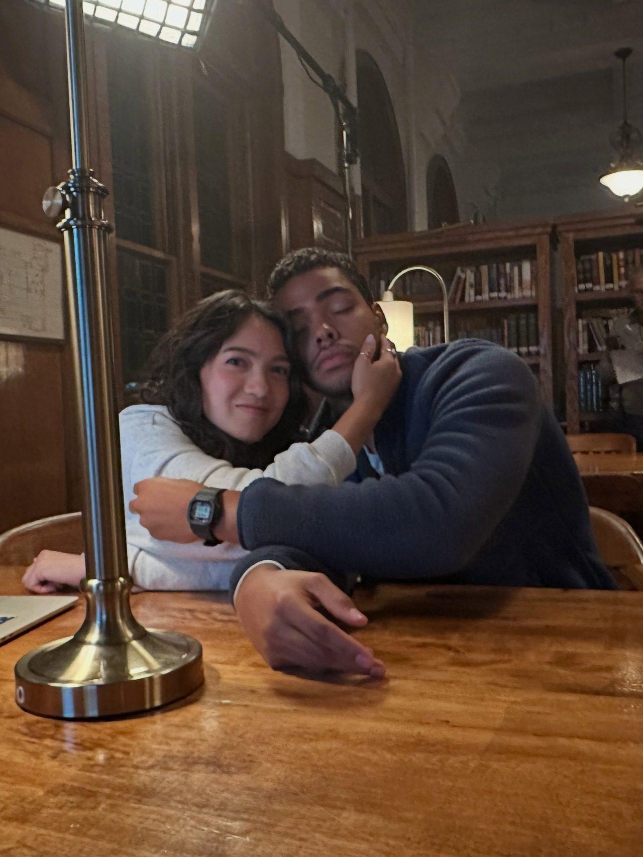 Author Ali Hazelwood is seen posing for a goofy picture with actor Tom Bateman.