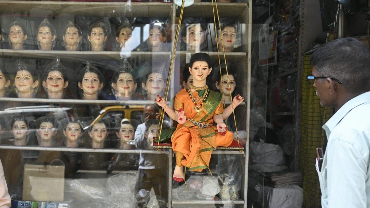 Shopkeepers have been busy arranging Gauri masks, idols and decorative ensembles for devotees preparing to welcome the goddess into their homes