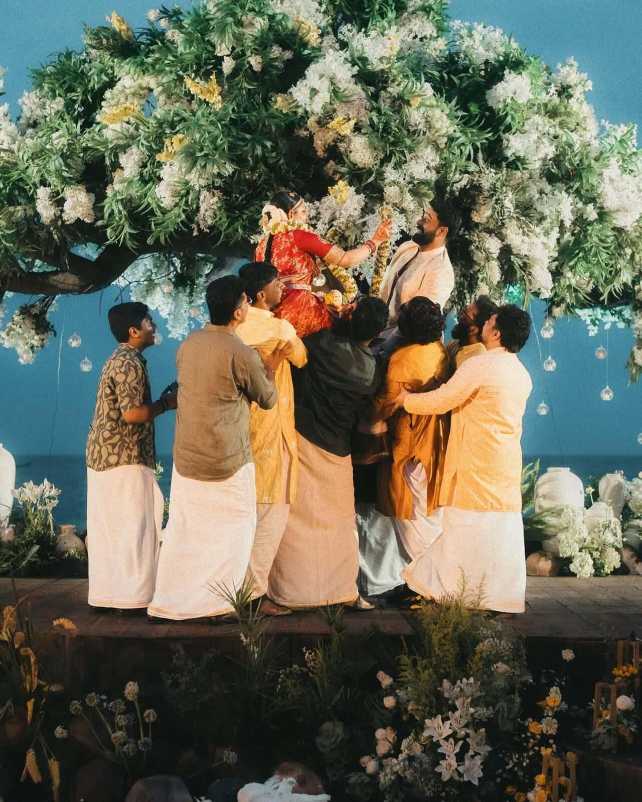When friends get to have fun, Ahaana and Nimish's friends carried them on their shoulders during their Jaimala ceremony. The duo were enjoying the moment