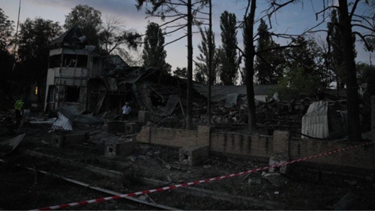 A Ukrainian rescuer works at the site of a Russian strike in Kyiv as emergency teams respond to the latest wave of attacks on the capital