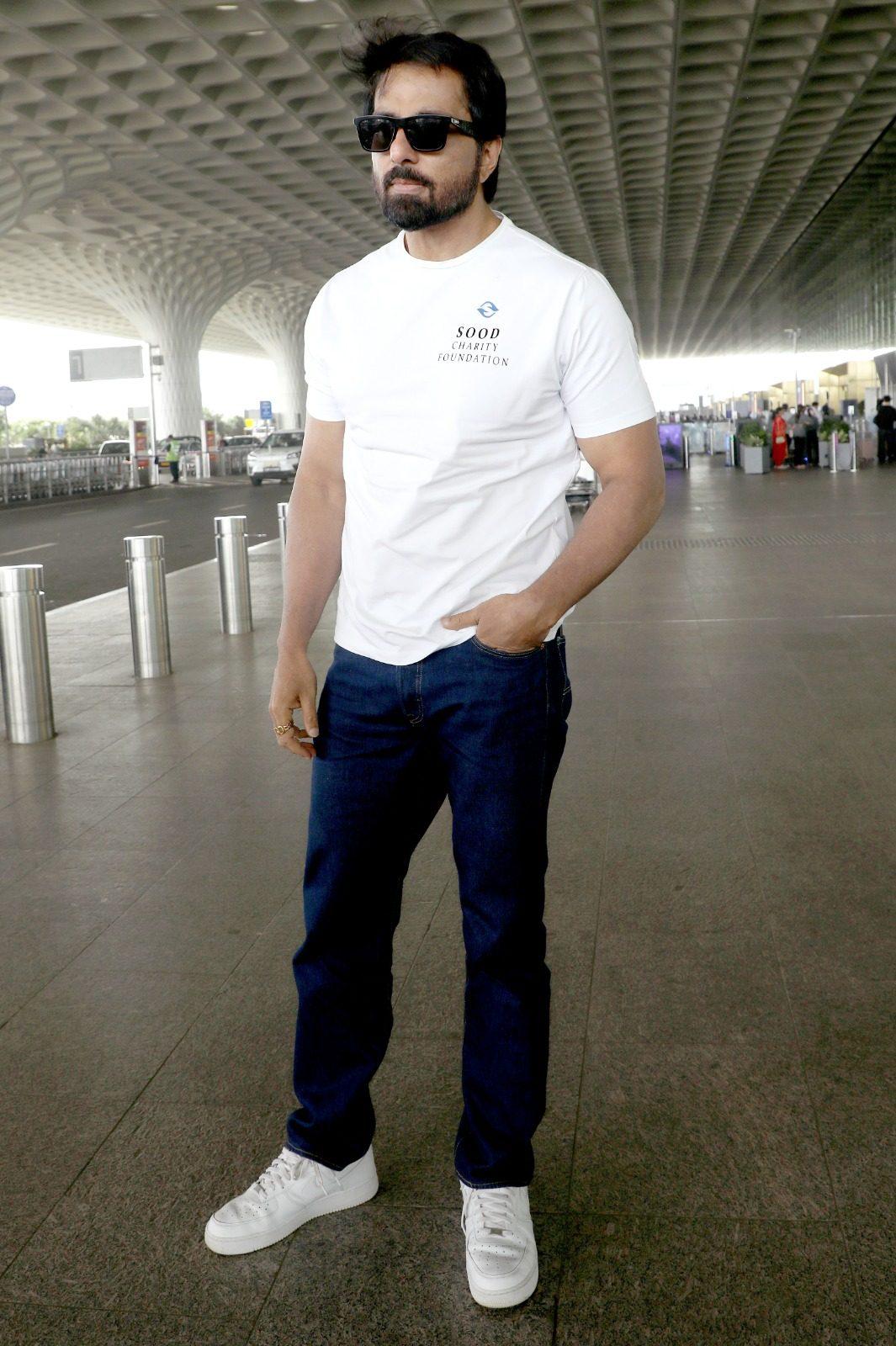 Sonu Sood kept it stylish and simple at Mumbai airport, sporting a white T-shirt paired with blue jeans.