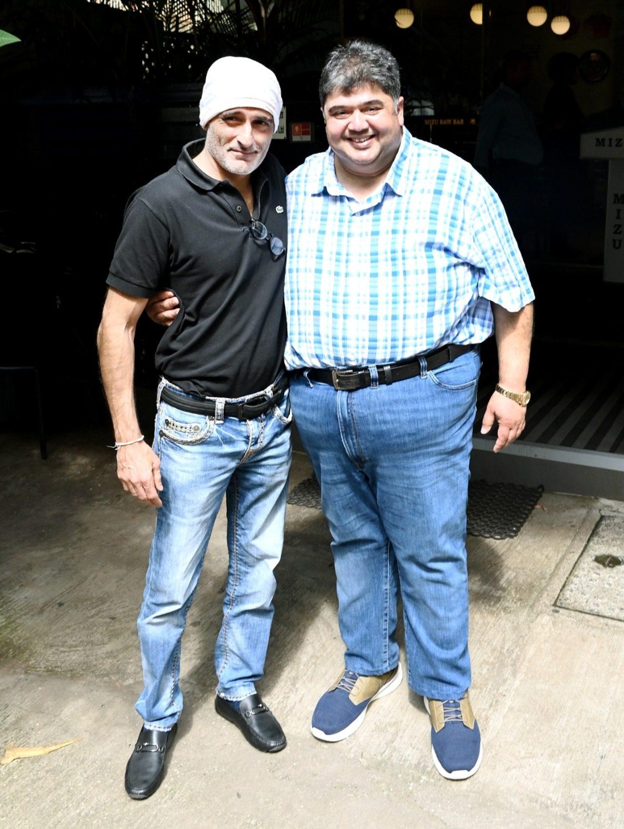 Akshaye was seen posing with producer and actor Rajat Rawail outside the restaurant.
