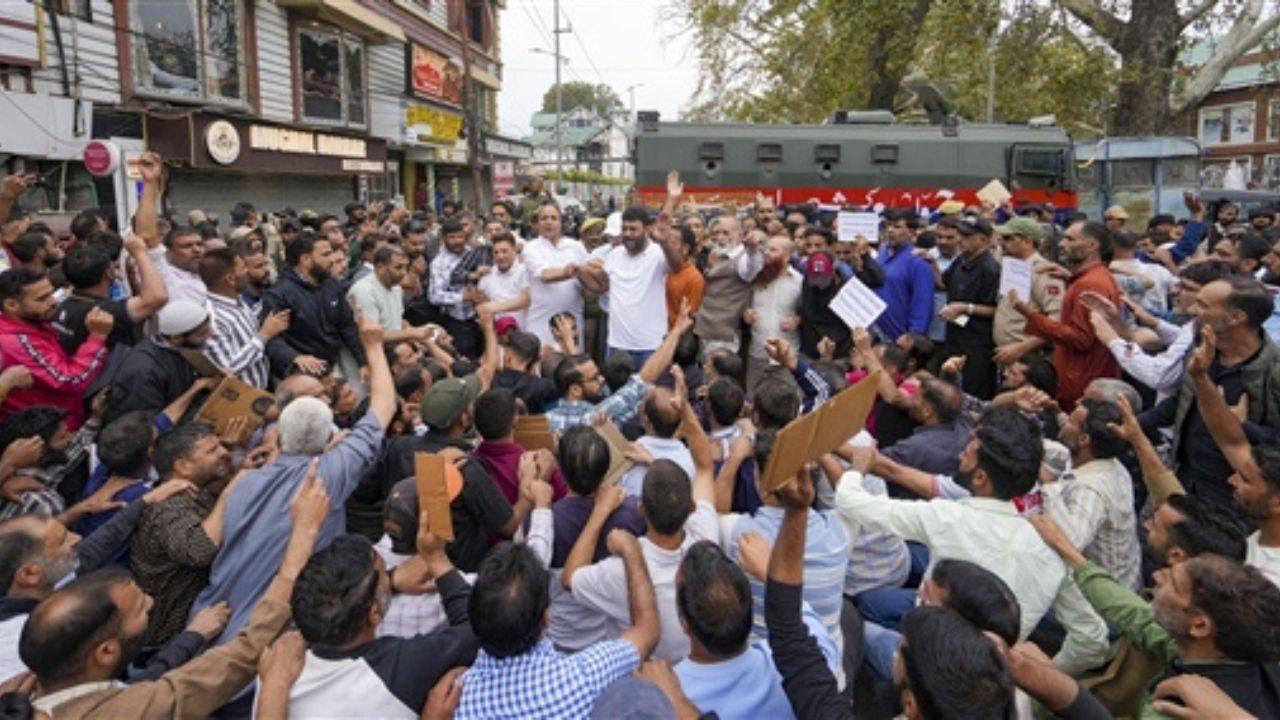 Workers hold a protest in Srinagar, seeking regularisation of their jobs and improved livelihood security Workers hold a protest in Srinagar, seeking regularisation of their jobs and improved livelihood security