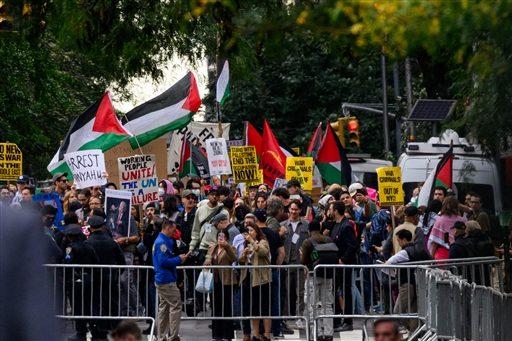 Pro Palestinian protesters against Israeli Prime Minister Benjamin Netanyahu and the war in Gaza and Iran walk down 2nd Avenue and block the avenue next to the United Nations