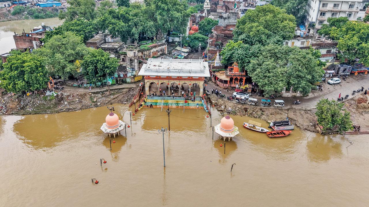 UP floods: Over 17,000 evacuated, 26 districts hit Aerial view of the partially submerged Balua Ghat. Pic/PTI