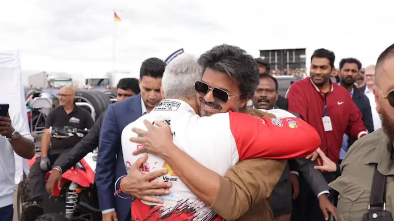 Watch: Vijay hugs Ajith Kumar at Silverstone as viral video wins over fans Ajith Kumar and Tamil Nadu CM Vijay (Picture via X)