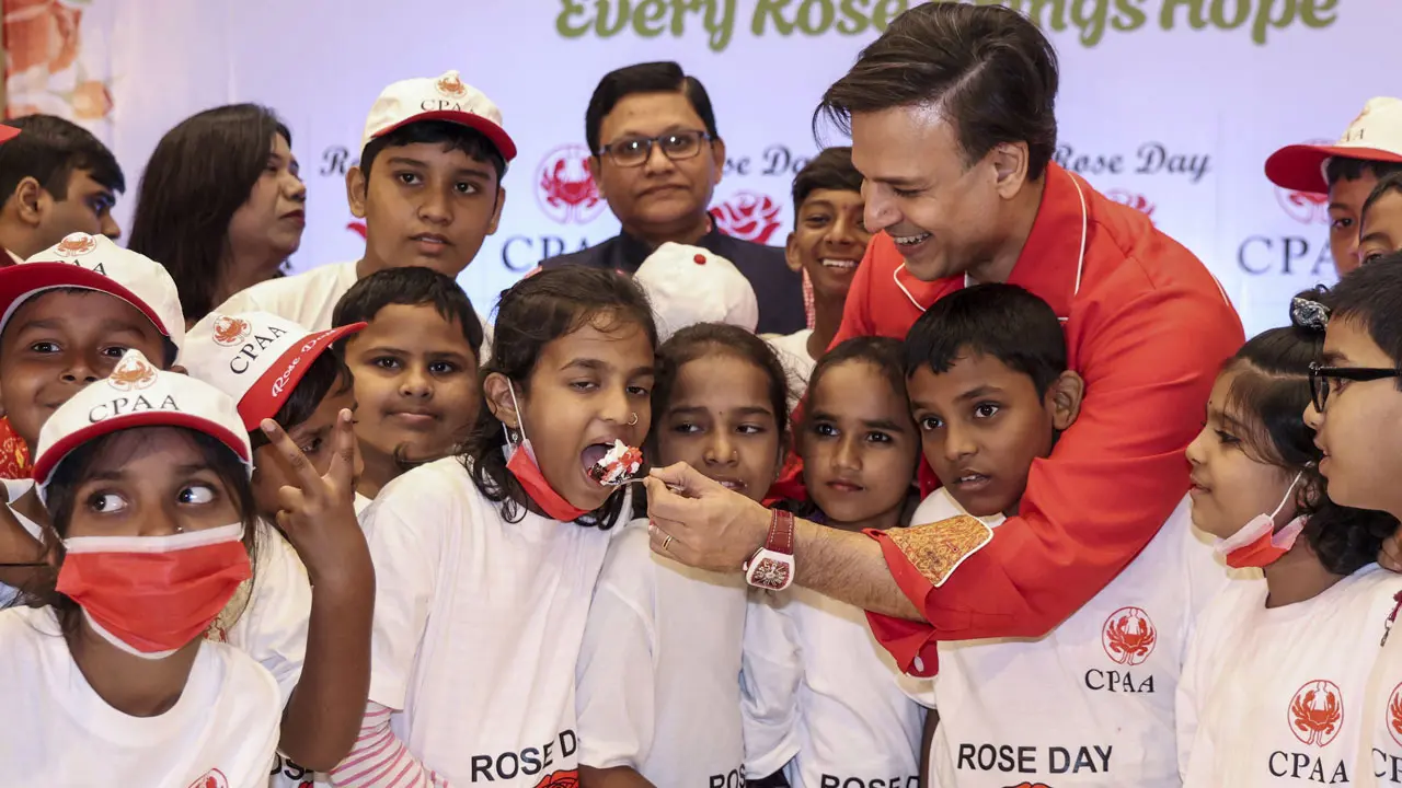 'I used to pray everyday': Vivek Oberoi recalls adopting Sahara during her cancer battle Actor Vivek Oberoi interacts with cancer-affected children, patients and survivors during the Cancer Patients Aid Association's National Cancer Rose Day celebrations, in Mumbai, Maharashtra. Pic/PTI