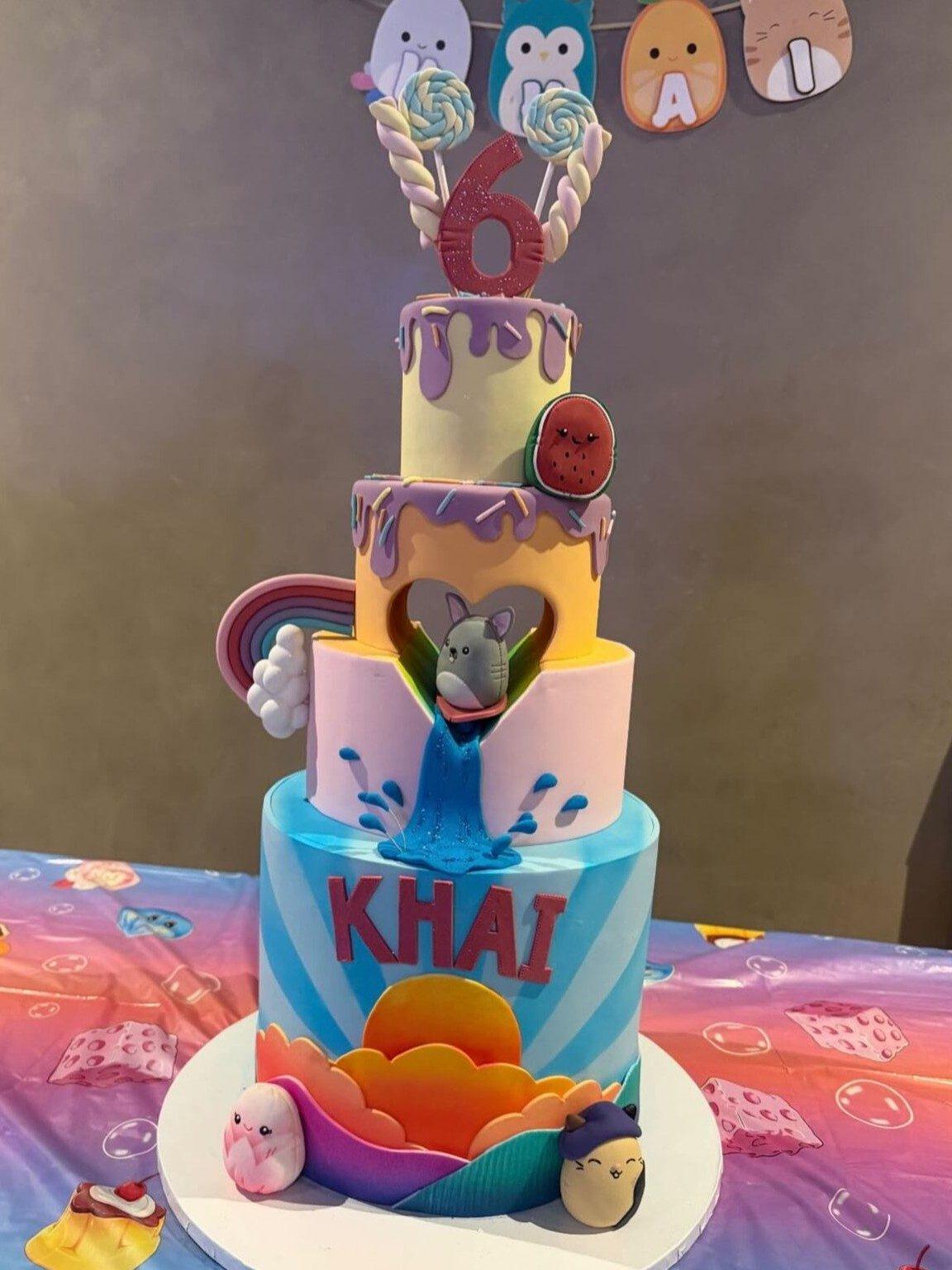 Khai’s birthday celebration featured a vibrant multi-tiered cake that perfectly matched the colourful theme of the bash. Khai’s birthday celebration featured a vibrant multi-tiered cake that perfectly matched the colourful theme of the bash.
