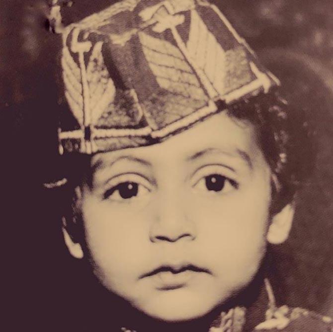 We can't get our eyes off this adorable munchkin! Yes, that's Abhishek Bachchan, probably a 2-year-old Abhishek?