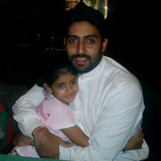 Guess who is that pretty little girl hugging Abhishek Bachchan! Well that's Shweta Bachchan Nanda's daughter Navya Naveli Nanda. Abhishek posted this cute picture saying, 'When did you grow from this to the elegant lady you are today? When did you grow from mamu picking you up from the airport to you coming to pick him up at the airport? When did you grow from mamu singing you to sleep to both of us staying up all night dancing? When did you grow from mamu shopping for you to you being my official shopper? When did you grow to decide that mamu still can't treat you like the little bundle you used to be? When? To my favourite, to my niece, to my Navya.... Happy 20th Birthday little lady. Mamu loves you very much. [sic]'
