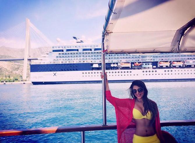 Aarti Chabria is a curd lover too. 'You'll also catch me gorging on all types of curds. Dahiwala Chawal (curd rice) with salt and rai ka tadka is just perfect. I love curd and have it with almost every meal.' In picture: Aarti Chabria enjoys a cruise in a sexy yellow bikini.